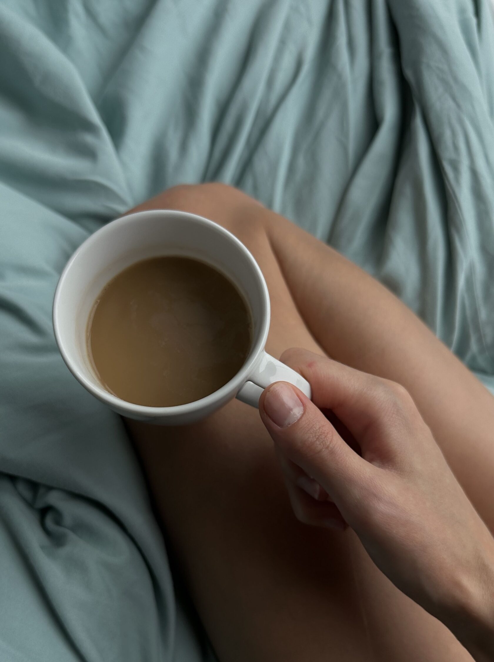 Coffee cup in soft bedding